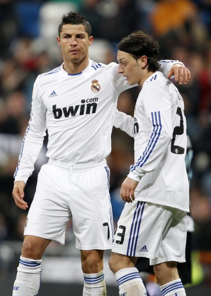 Real-Madrid-s-Ozil-congratulates-Cristiano-Ronaldo-after-he-scored-against-Malag